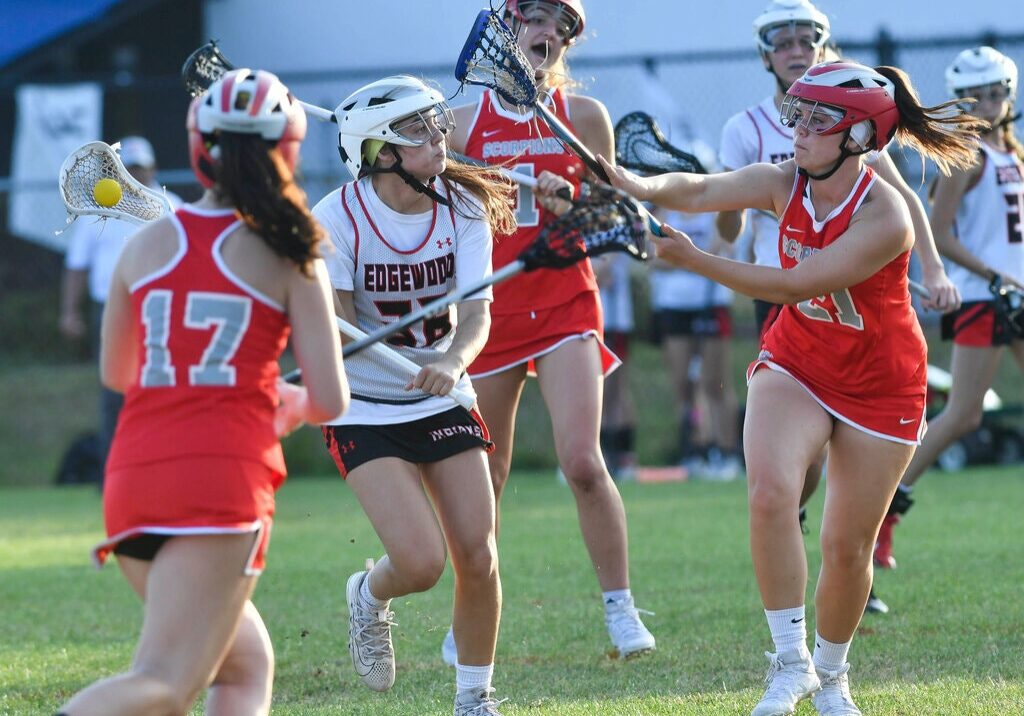 Lacrosse players from Edgewood High School and Satellite High School in Florida wore headgear when they faced off in March